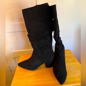 New never worn calf high boots